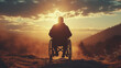 Homme en fauteuil roulant dans la nature qui regarde le paysage et le coucher de soleil