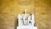 The Statue Of Abraham Lincoln Sitting In A Chair At The National Mall Memorial In Washington DC (USA), Is One Of The Presidents Of North America.