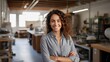 © CStock - Portrait of a female engineering student in a workshop looking