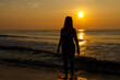 © suthin3 - Woman body big with bikini and sunrise on beach
