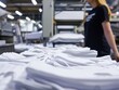 © Svetlana - stock picture of print manufacturer, showing stock of muted colorful blank tshirts.