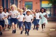 © Natalia - group of kids running in a schoolyard race