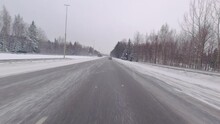 Winter conditions on the highway don't hinder the car, which expertly speeds through snowy terrain.