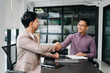 © Nuttapong punna - Those who work hard, win in the conference room new startup project.