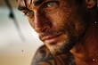 A rugged man stares intently at the camera, his freckled face adorned with a striking tattoo, conveying a story of strength and vulnerability through the lines etched on his flesh