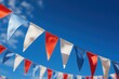 Close-up of pennant flags against blue sky, in the French National Colors, Sault, Provence, Vaucluse,