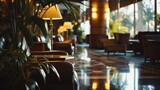 Fototapeta Przestrzenne - A spacious hotel lobby filled with numerous chairs and elegant lamps. Ideal for use in hospitality industry promotions or interior design websites