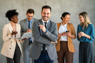 Wall Mural - Success group of multiethnic entrepreneurs and business people achieving goals in corporate office