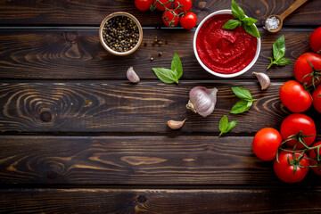 Wall Mural - Italian tomato sauce for pasta - passata with tomatoes and basil