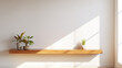 Effortless Elegance: Wood Floating Shelf on White Wall for Stylish Storage