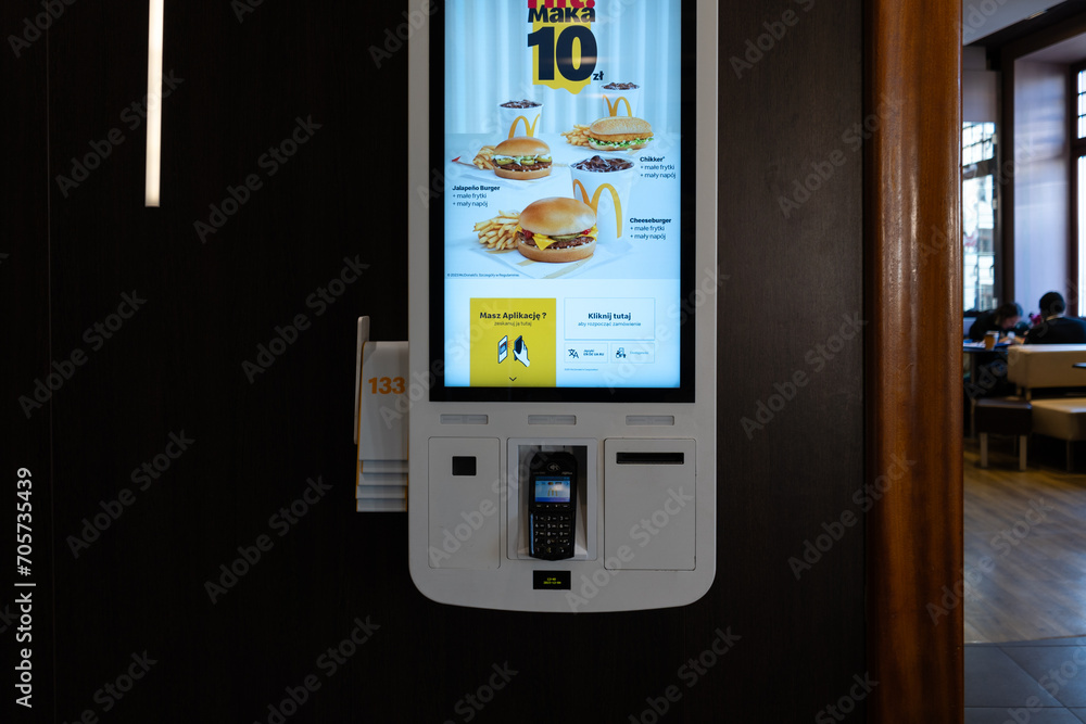 Self-service kiosk with screen, inside McDonald's restaurant. Self ...