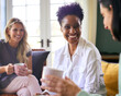 © Monkey Business - Three Mature Female Friends In Lounge At Home Meeting For A Chat And Hot Drink