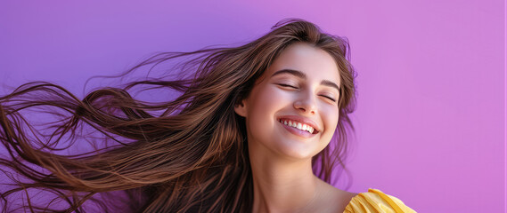 Wall Mural - Smiling young pretty woman with brunette brown long groomed hair isolated on flat purple background with copy space. Perfect hair care products banner template, hair salon.