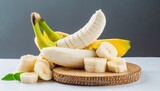 bunch of banana fruits peeled cut bananas on white background