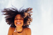 © Dasha Petrenko - Close up portrait of happy african american female teenage smiling sweetly at the camera