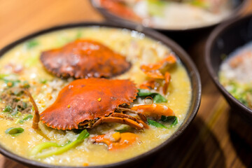 Canvas Print - Seafood congee bowl with crab in restaurant