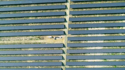 Wall Mural - Top down drone Shot of solar panels. Drone looks 90 degrees downwards