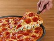 © Richard - Pepperoni Pizza Slice Pull