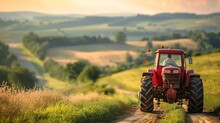 A Farmer Driving A Vintage Tractor, Adding A Touch Of Nostalgia To The Picturesque Rural Landscape. [Vintage Tractor Charm]
