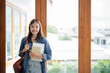 © mojo_cp - Portrait of Asian female student in university..