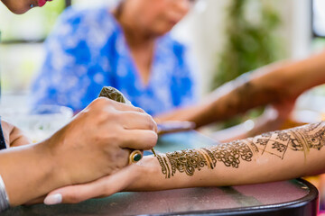 Indian bride's henna mehendi mehndi hands close up