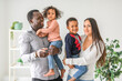 © Louis-Paul Photo - family with boy and girl child posing on photo shooting, in the living room