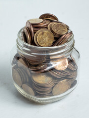 Old Egyptian Coins in Glass Jar, Saving Concept