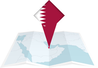 Wall Mural - Qatar pin flag and map on a folded map