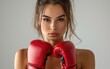 Beautiful gym girl in a training class wearing boxing gloves