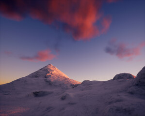 Wall Mural - Snowy mountain under a sky with some clouds during sunset.