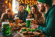 People Celebrating St Patrick's Day In A Irish Beer Pub In A Leprechaun Costumes. Saint Patrick's Day Concept With Copy Space. Group Of Friends Drinking Beer And Having Fun In A Irish Pub. St. Patrick