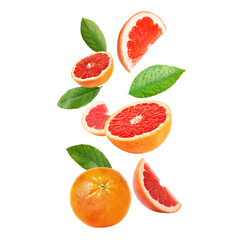 Sticker - Fresh grapefruits and green leaves falling on white background