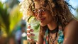 Young Woman Drinking Refreshing Mint Mojito In The Sunlight.  (Generative AI).
