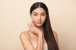 © kitthanes  - Beautiful young asian woman with clean fresh skin on beige background, Face care, Facial treatment, Cosmetology, beauty and spa, Asian women portrait.