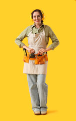 Sticker - Female worker with bag of tools on yellow background