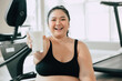 sport healthy fat women happy smiling enjoy drink milk and diet exercise activity in fitness sport club