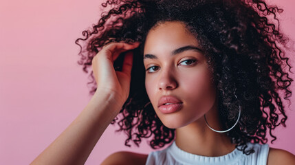 Young woman posing in front of clean background.Copyspace for text.