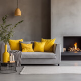 Fototapeta  - Jasna sofa z żółtymi poduszkami na tle betonowej ściany z kominkiem. Skandynawski wystrój wnętrz nowoczesnego salonu. Skandynawski wystrój wnętrz. Dużo światła. Jasne przestronne wnętrze