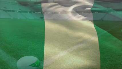 Wall Mural - Animation of waving flag of nigeria over stadium with rugby ball