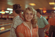 © Simonforstock - Portrait of smiling young woman in american diner cafe of 1950s years