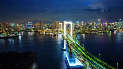 Wall Mural - Hyperlapse of Rainbow bridge at night in Tokyo, Japan.