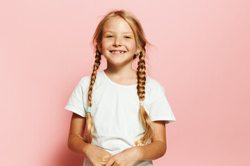 Charming Schoolgirl With Trendy Style and Adorable Hairdo Poses in Studio Setting