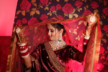 Wall Mural - Portrait of traditional indian bride wearing kundan jewelery