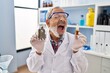 Frustrated and furious mature man scream in anger at laboratory, strong expression of rage over cannabis medicine