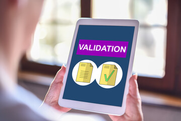 Wall Mural - Document validation concept on a tablet
