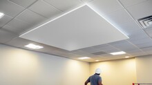 Ceiling installation with professional technicians. Generative AI