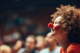 Fototapeta  - curly red-haired girl with a clown nose, April 1st, April Fool's Day, funny clown, circus performer
