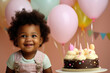 dark-skinned curly child, with birthday cream cake and balloons