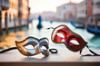 Two carnival masks, blurred background of Venice