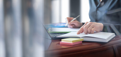 Business woman are engaged in planning work in the office.